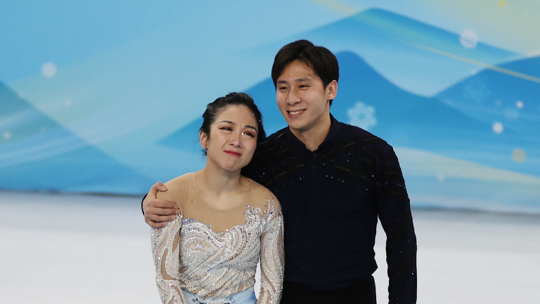 Skater chinois Han Cong pour se présenter à la commission des athlètes du CIO