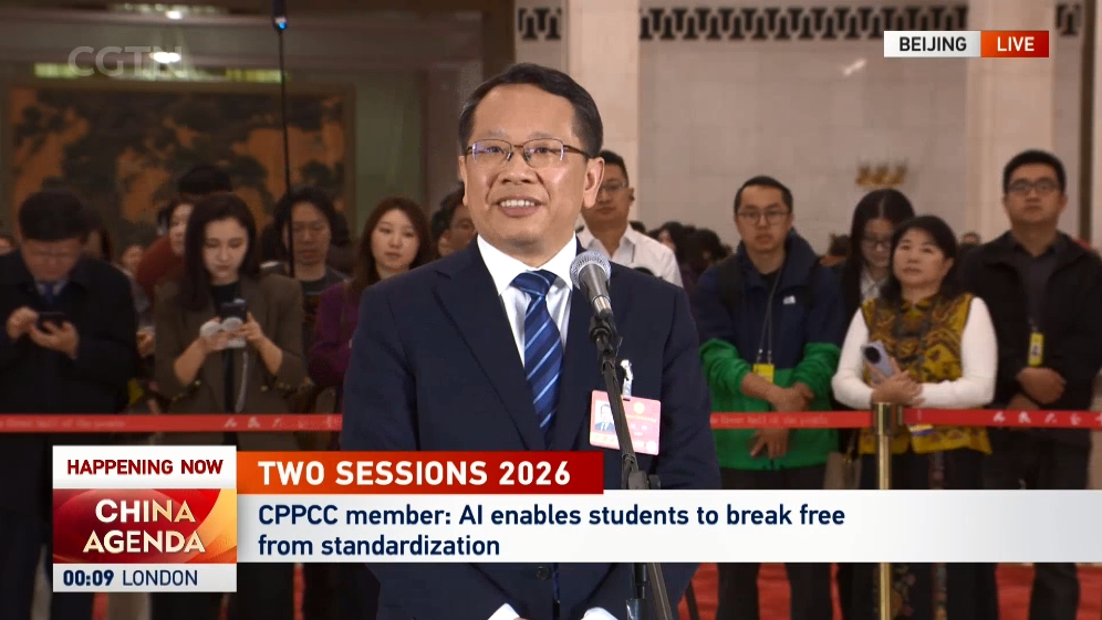 Xu Kun, membre du 14e Comité national de la Conférence consultative politique du peuple chinois, s'exprime dans le couloir des membres à Pékin, en Chine, le 11 mars 2026. /CGTN