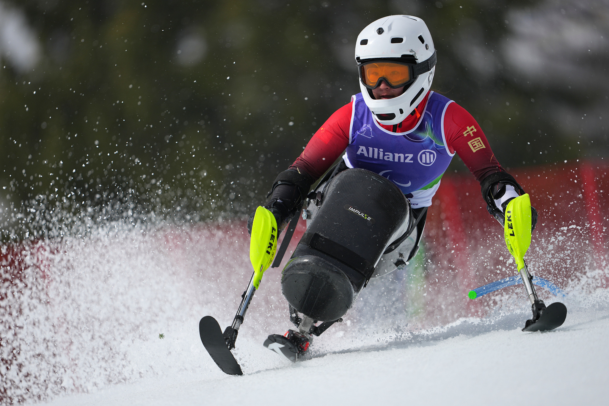 Zhang Wenjing, de Chine, participe à sa première course de slalom géant féminin de ski alpin aux Jeux paralympiques d'hiver de 2026, à Cortina d'Ampezzo, en Italie, le 14 mars 2026. /VCG