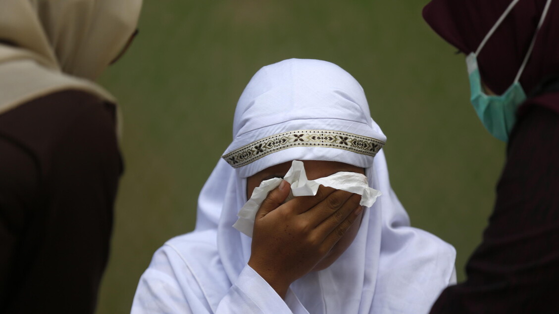 In Indonesia, public flogging of two men and two women in Aceh