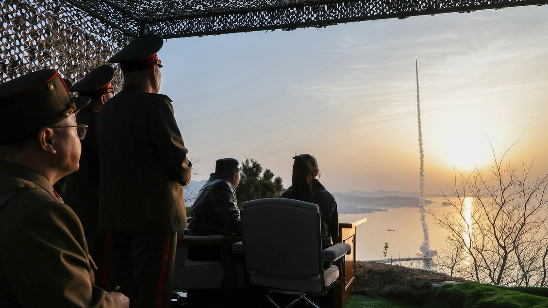 Pyongyang confirms missile test, Kim also present