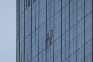 Beijing, the pilot of the plane that crashed into a skyscraper yesterday died