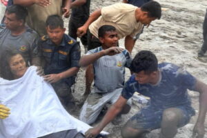 In Nepal, a 64-year-old was rescued after 10 days in her house buried in mud and debris