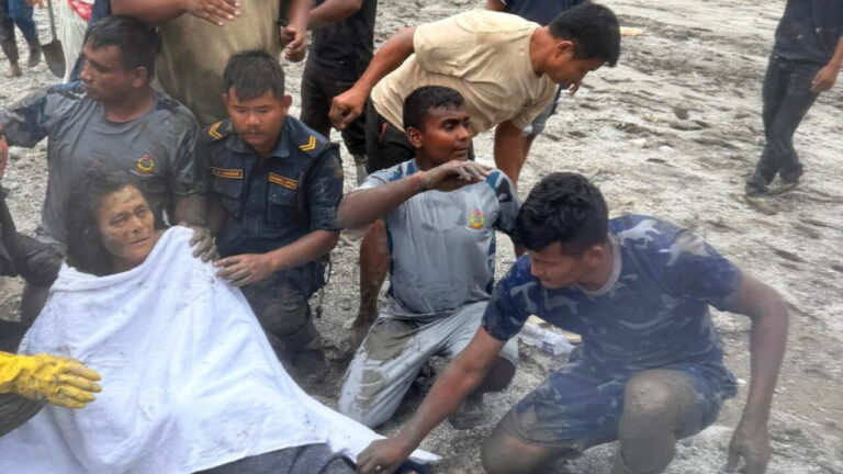 In Nepal, a 64-year-old was rescued after 10 days in her house buried in mud and debris
